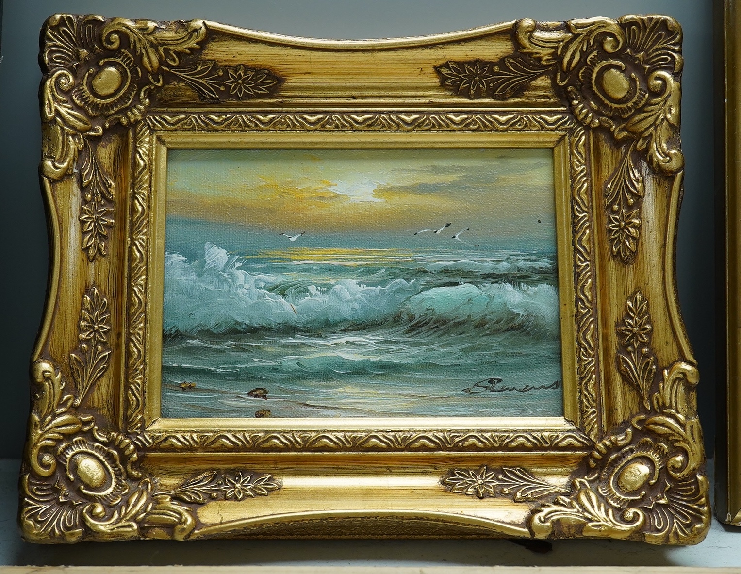 Stevens, Contemporary oil on canvas board, Seascape with crashing waves, signed, 11 x 16.5cm, ornate gilt framed. Condition - good